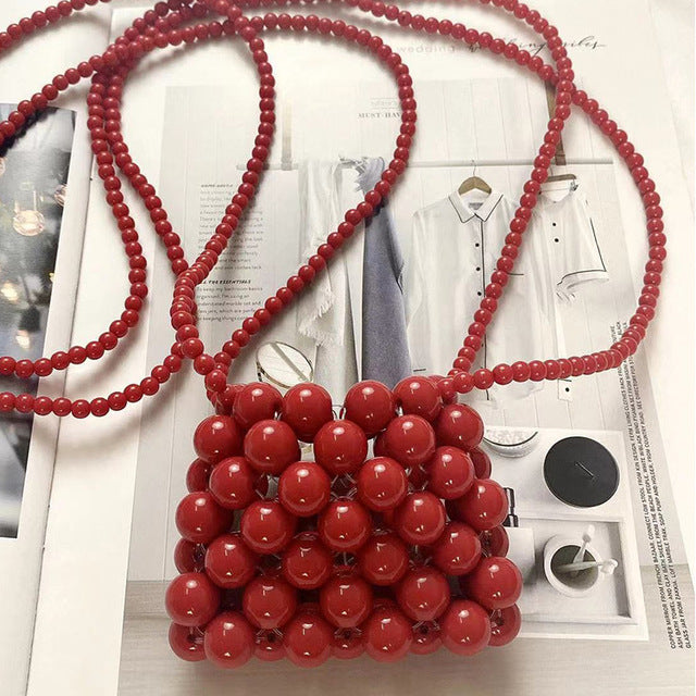 Lucy Ball Crossbody Bag
