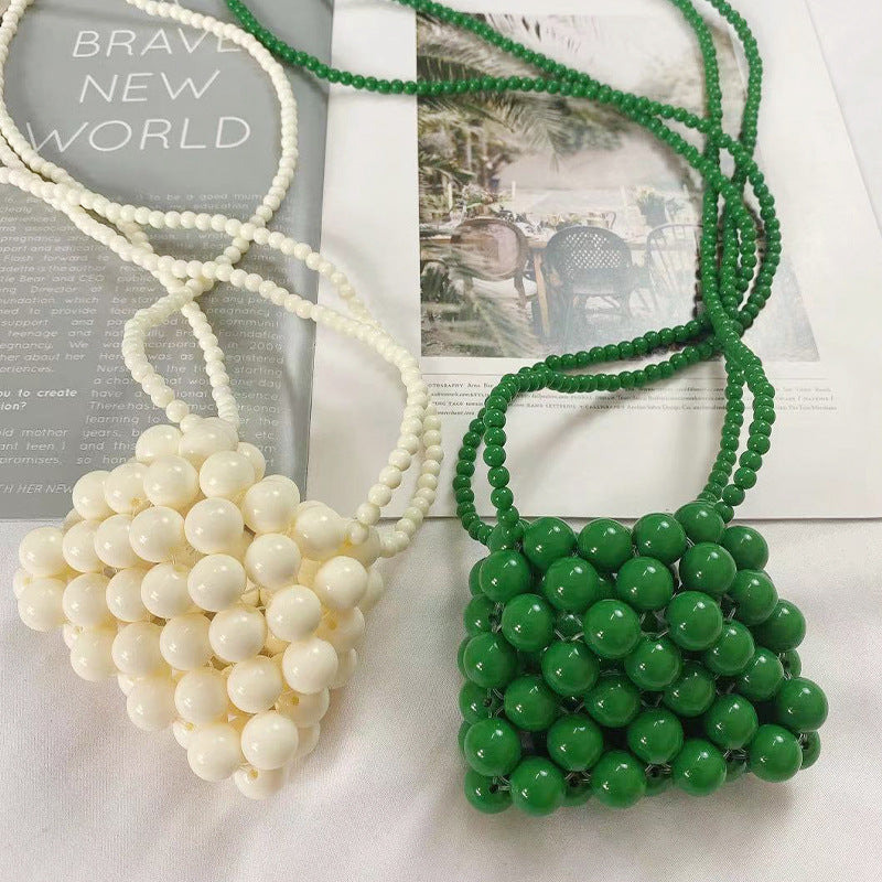 Lucy Ball Crossbody Bag
