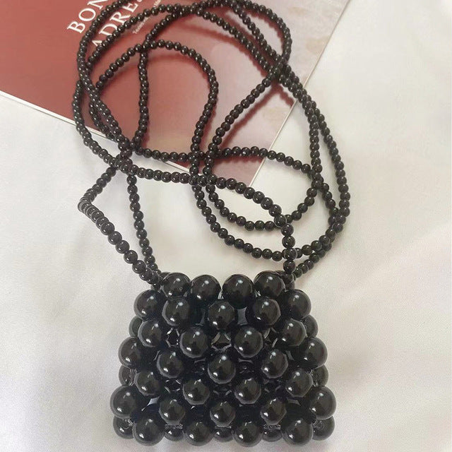 Lucy Ball Crossbody Bag