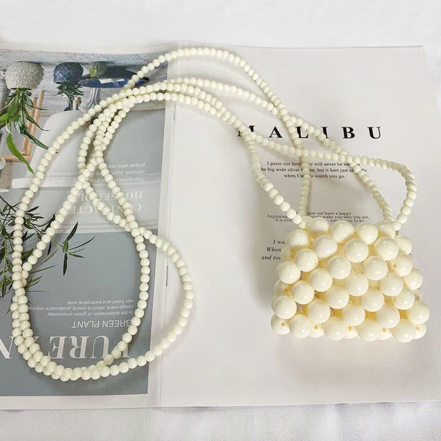 Lucy Ball Crossbody Bag