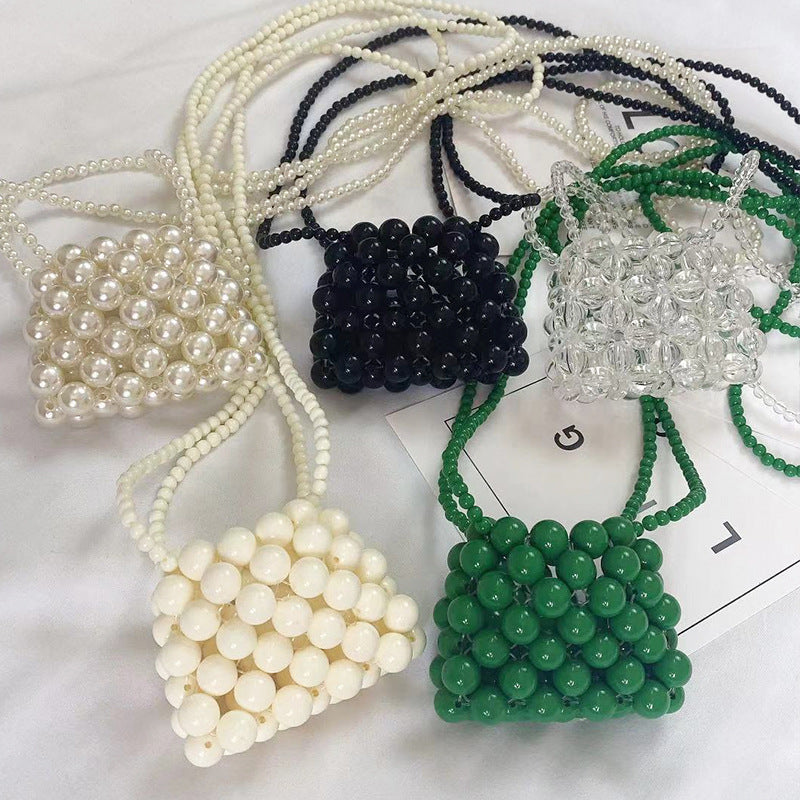 Lucy Ball Crossbody Bag